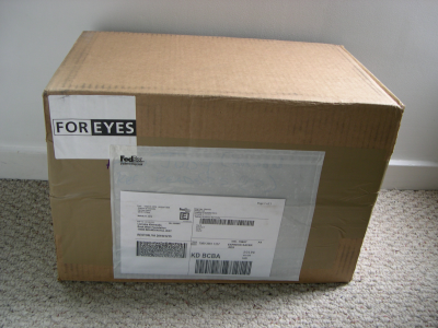 Box of reading glasses from For Eyes